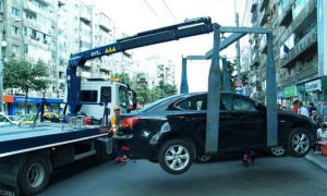 Decizie finală: Polițiștii locali pot RIDICA mașinile parcate ilegal