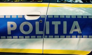 Un polițist din județul Giurgiu a fost găsit ÎMPUȘCAT în cap în mașina personală
