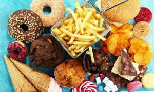 Reclamele la junk food, INTERZISE în Marea Britanie