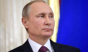 Șeful spionilor din Marea Britanie avertizează: Rusia pregătește un cyber atac împotriva țărilor care sprijină Ucraina