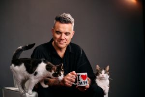 Felix și Robbie Williams fac echipă pentru a sărbători viața PISICILOR